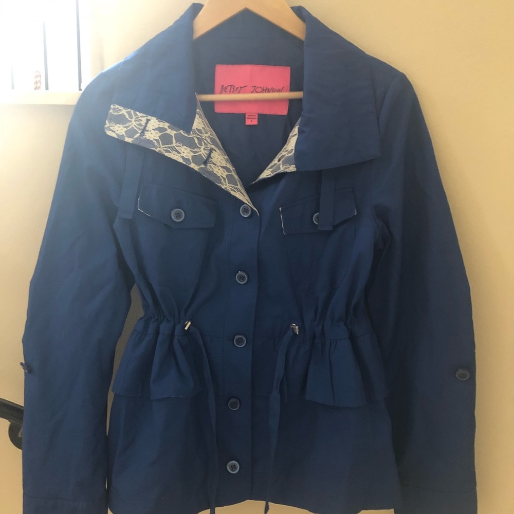 Betsy Johnson rain coat with lace trimming.
